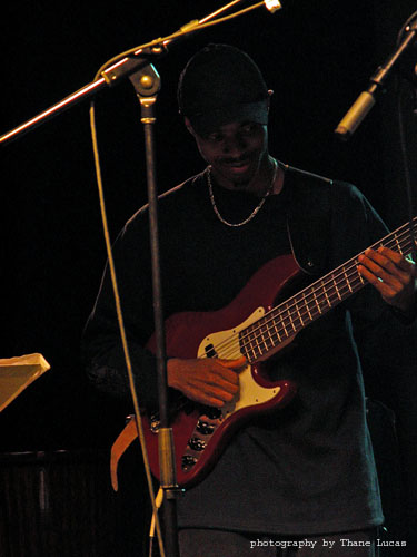 Andrew Stewart - red electric bass